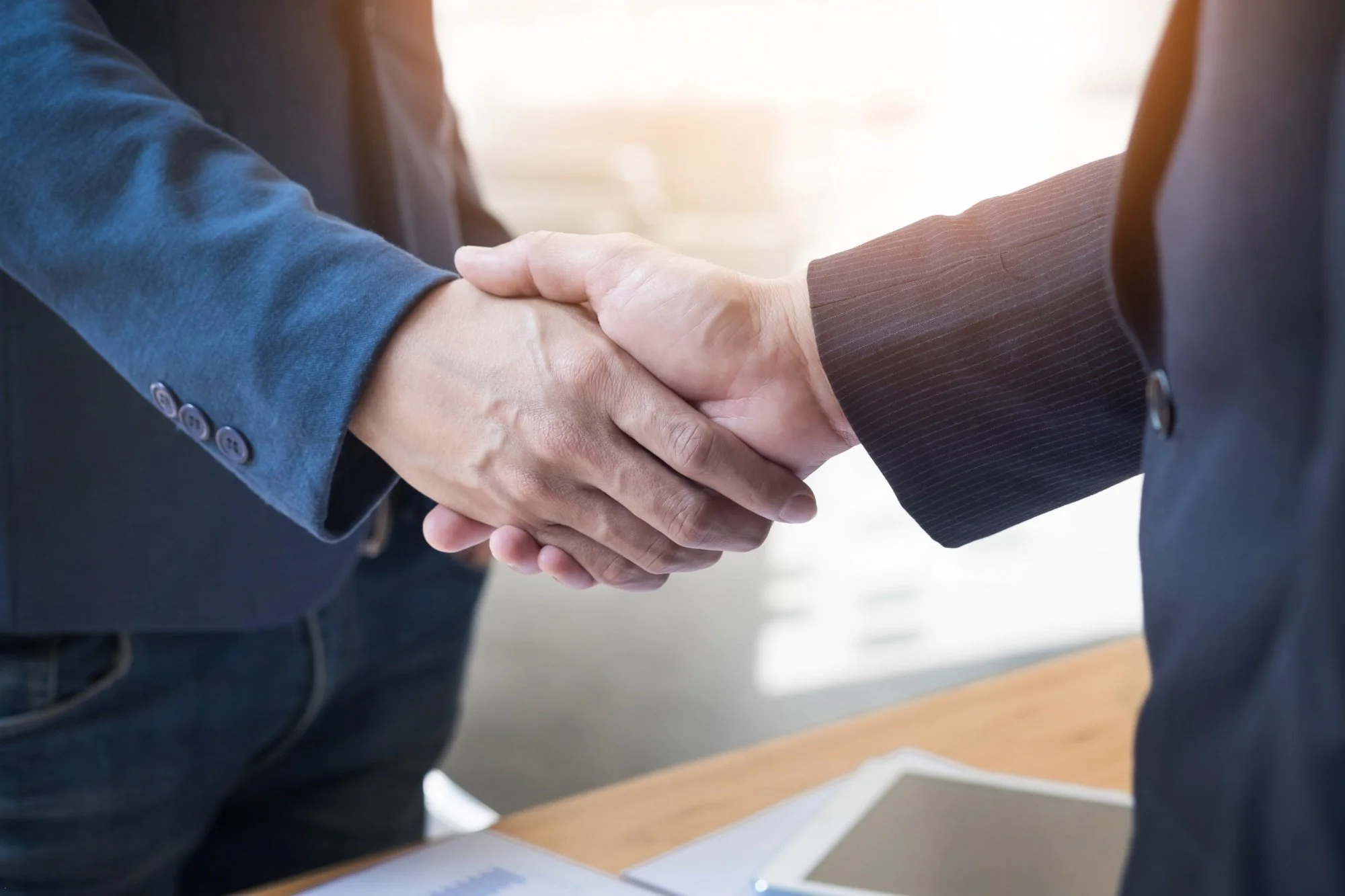 Handshake between construction professionals